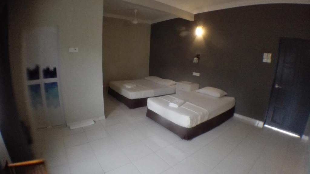 Tebing Guest House Taman Negara Malaysia กัวลาทาฮัน ภายนอก รูปภาพ